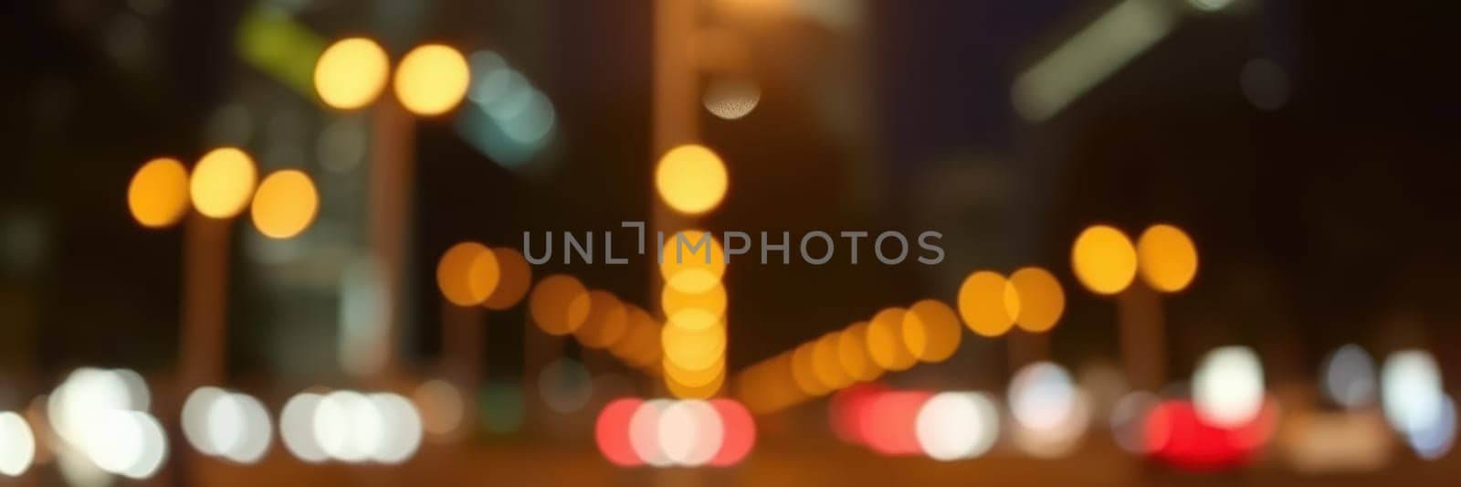 A bustling urban street is filled with glowing lights at night, showcasing the movement of cars and pedestrians against a blurred background. The energetic ambiance captures life in the city.