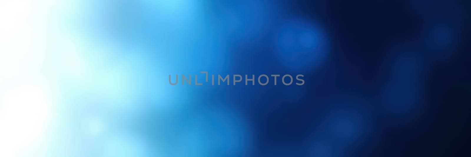 Soft blue and light gradients create a soothing atmosphere with blurred textures. This tranquil background is perfect for design projects or digital art.