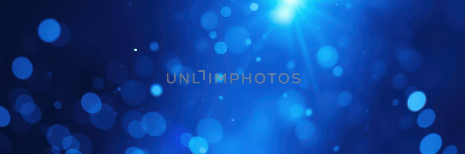 A vibrant blue backdrop with floating bokeh circles radiates a calming glow, ideal for creative designs, presentations, or digital art, enhancing visual aesthetics.