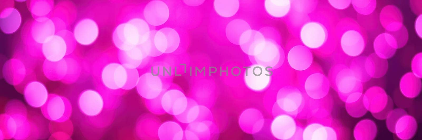 Soft purple bokeh lights create a dreamy ambiance, perfect for enhancing the mood at an evening celebration or social gathering. The glow adds warmth and excitement.
