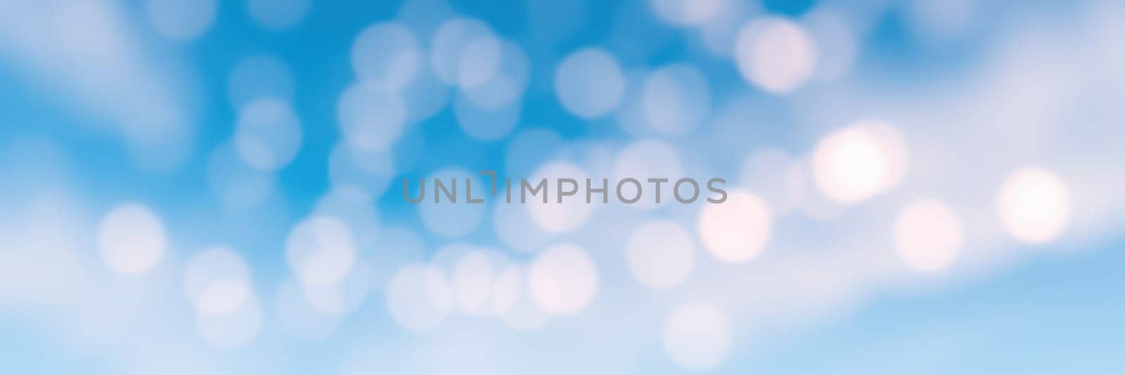 A serene blue sky is filled with soft, dreamy bokeh circles that provide a gentle and calming effect. The sun shines brightly, enhancing the scene's tranquility and beauty.
