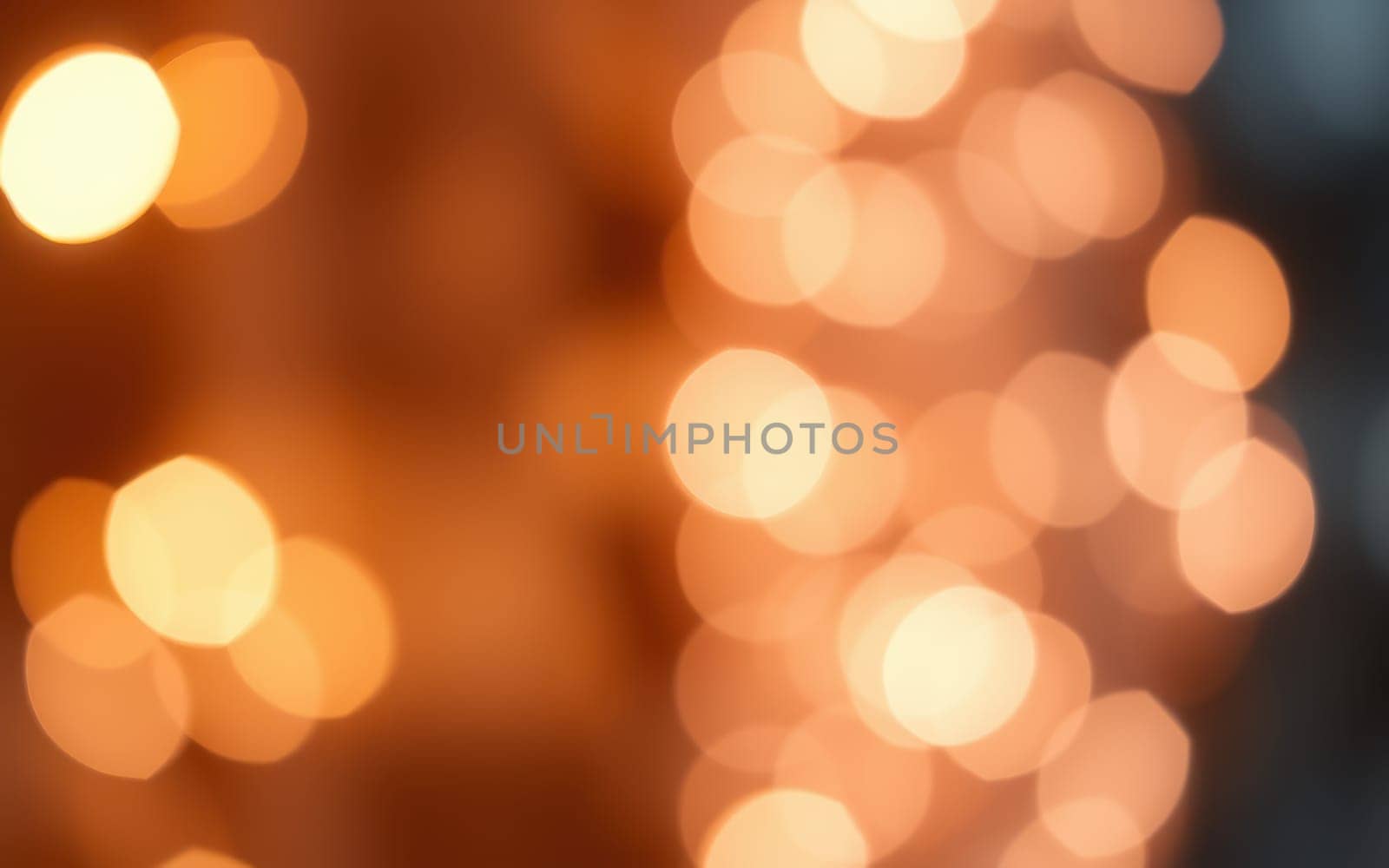 Soft bokeh lights illuminate a gathering, creating a cozy and festive atmosphere. The warm glow adds charm to the evening, inviting people to enjoy the moment.