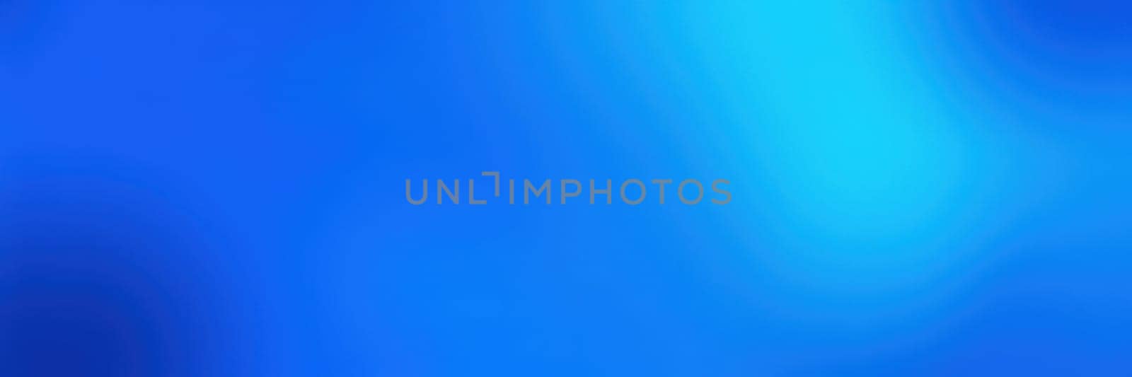 A vibrant blue background showcases smooth gradient tones. The calming hues create a serene environment suitable for web design and artistic projects.