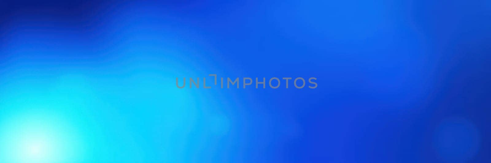 A bright blue abstract backdrop radiates tranquility and invites creativity, making it ideal for artistic projects or digital design applications.