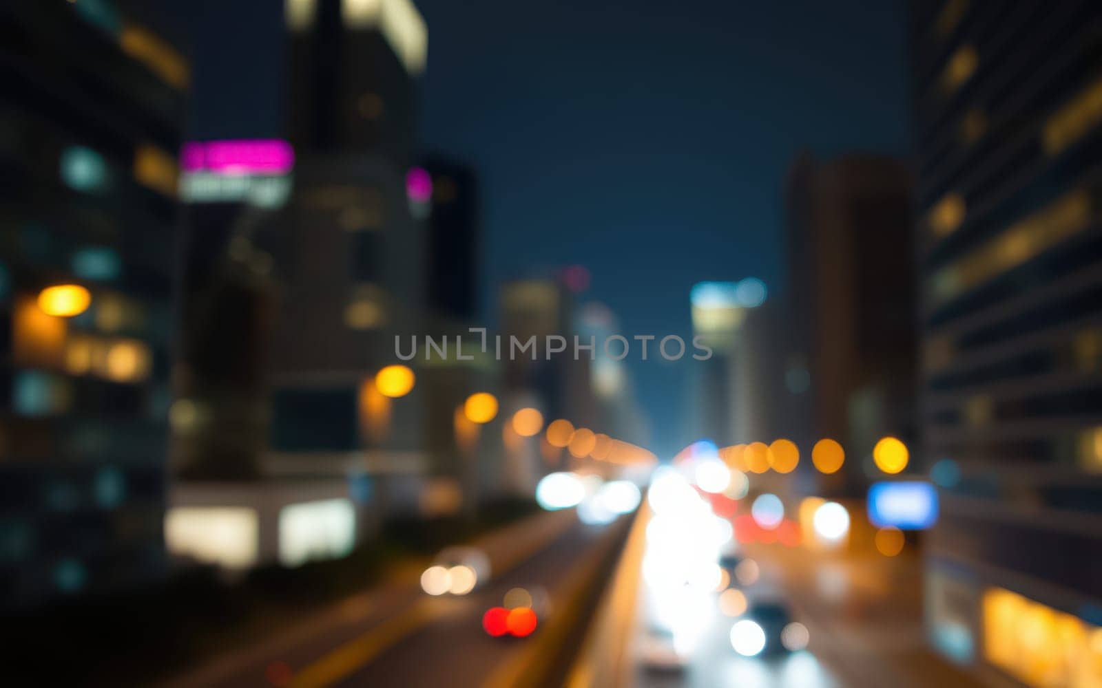Bright lights illuminate the bustling city streets at night, with cars moving along the road and skyscrapers standing tall in the background, showcasing urban energy.