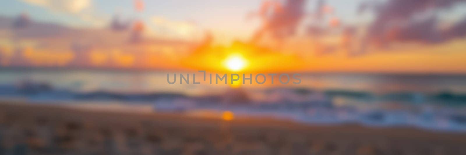 A breathtaking sunset casts warm hues across the sky as the sun descends towards the horizon. Soft waves lap against the sandy shore, creating a serene atmosphere.