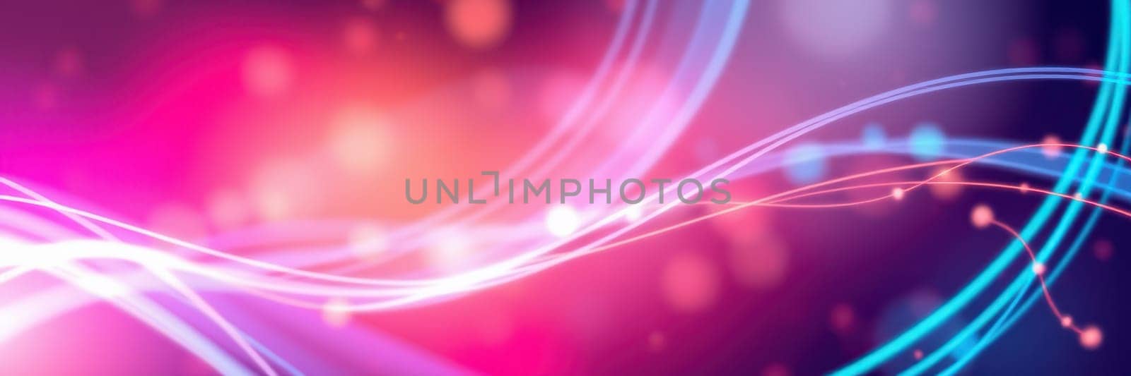 Bright and colorful light trails swirl through a dark background, creating an eye-catching and dynamic effect perfect for graphic design or artistic applications.