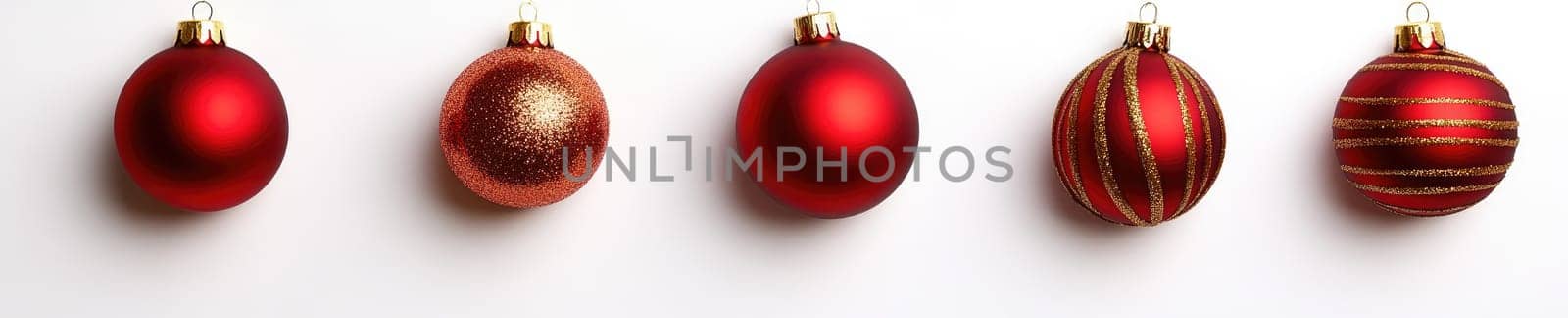 Festive Christmas background with red and gold baubles for holiday decoration and design.