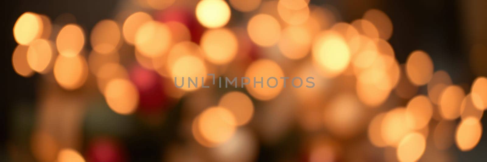 Soft, glowing lights twinkle warmly in a cozy environment, enhancing the festive mood in winter. The atmosphere feels inviting and filled with cheer.
