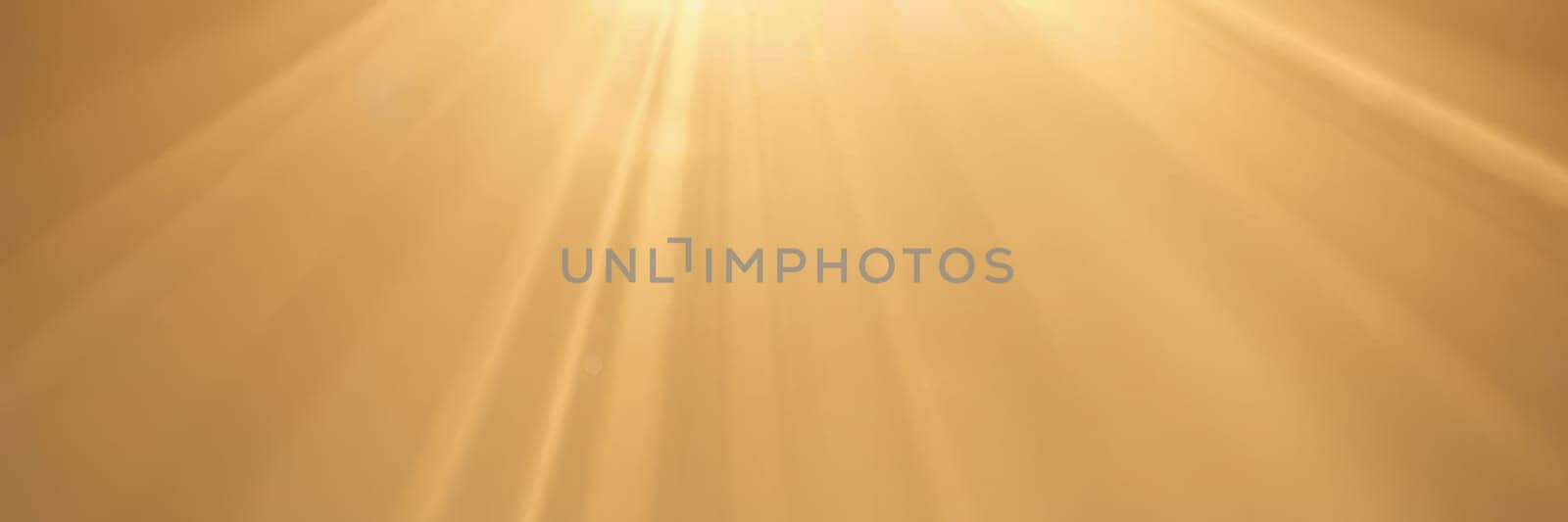 Soft golden rays illuminate the horizon as the sun sets. The warm light casts a serene ambiance over the landscape, enhancing nature's beauty during dusk.