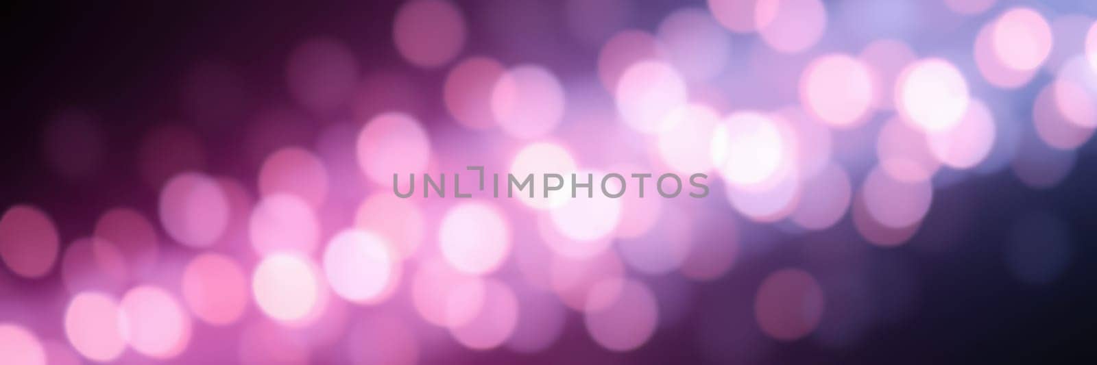 Bright, colorful bokeh lights illuminate a dark evening, enhancing the festive mood at an urban event with blurred backgrounds and sparkling effects.