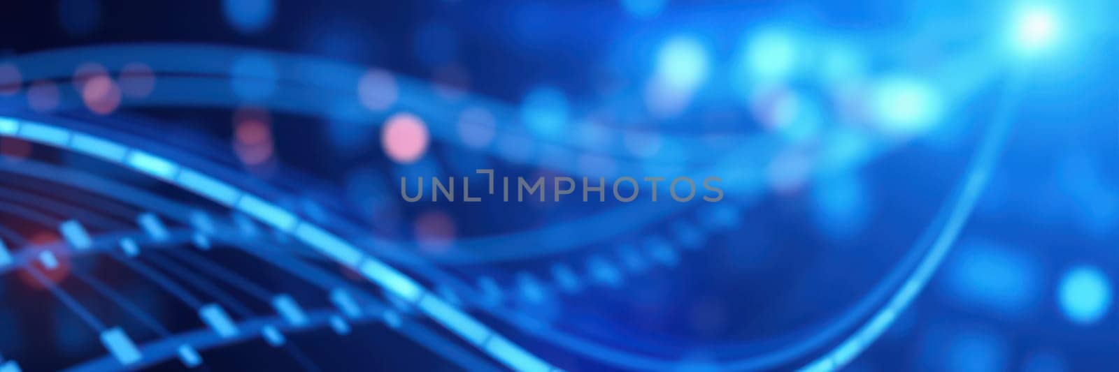 Bright blue and red light trails swirl and flow across a dark background, creating a lively and energetic digital atmosphere. The composition exudes movement and depth, evoking a sense of excitement.
