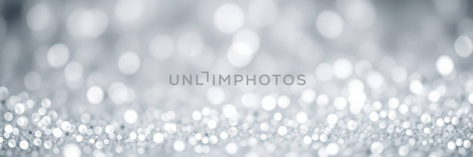 A beautiful display of shimmering silver bokeh lights creates an enchanting atmosphere, perfect for celebrations and special occasions, enhancing the joyful spirit of any event.