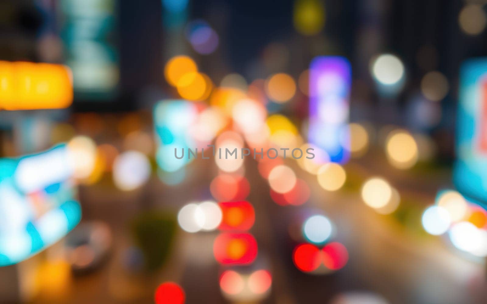 A bustling street at night with bright billboards and car lights creating a colorful blur. The lively atmosphere showcases the energy of urban life in the evening.