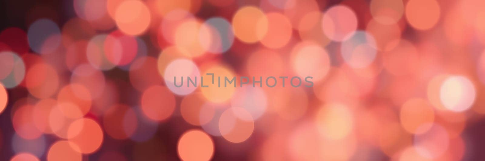 A captivating display of colorful bokeh lights illuminates the night sky, enhancing the festive mood during a celebration. The soft glow creates a magical ambiance.