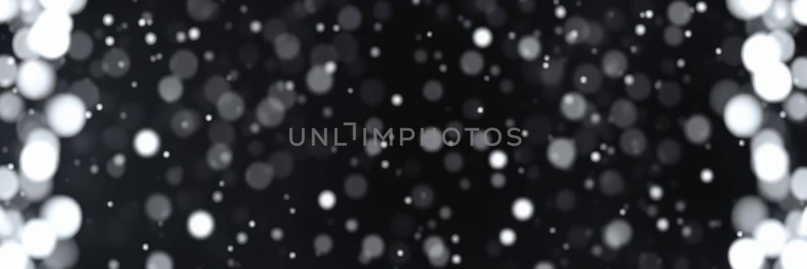 Light particles float gracefully in a dark space, creating a mesmerizing effect. The dance of these luminous specks captivates the viewer, providing a magical ambiance.
