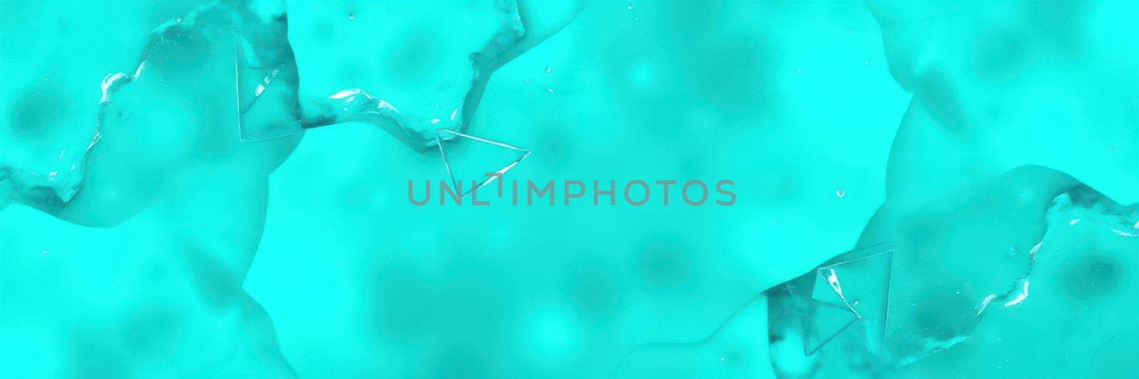 Turquoise waters ripple gently under bright sunlight, creating a serene underwater environment where light dances, reflecting beautifully on the surface.