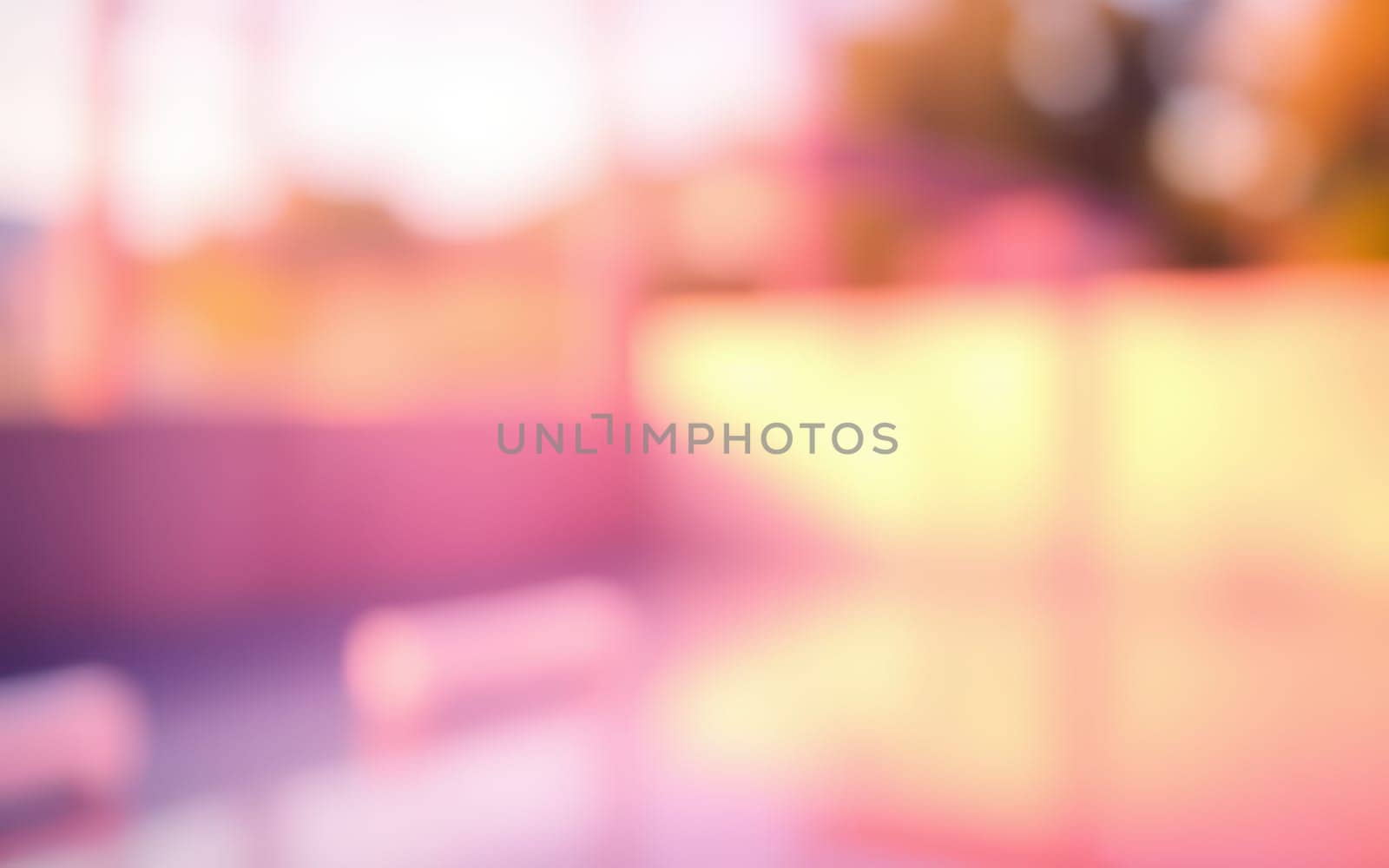 Soft colors blend in an abstract style, creating a dreamy atmosphere during sunset at an outdoor area, suggesting a peaceful and serene moment.