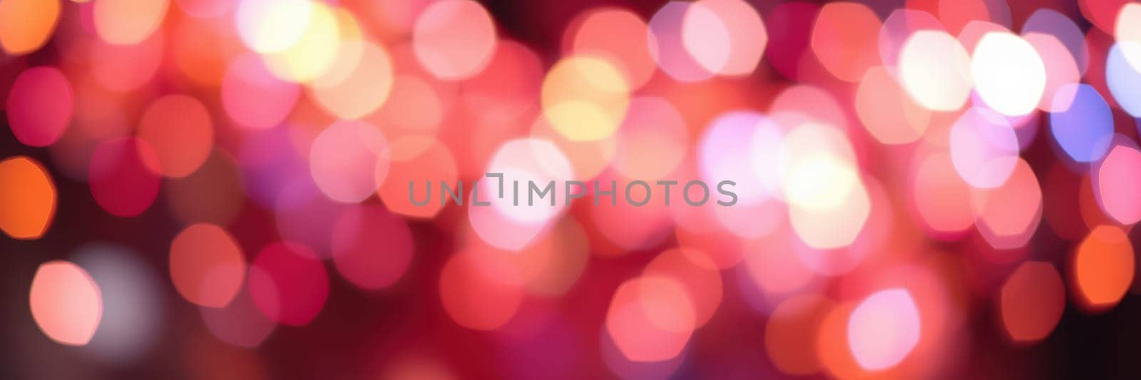 Soft, colorful lights illuminate the night as people gather to celebrate. The vibrant bokeh effect adds a magical touch to the lively atmosphere, enhancing the joy of the event.