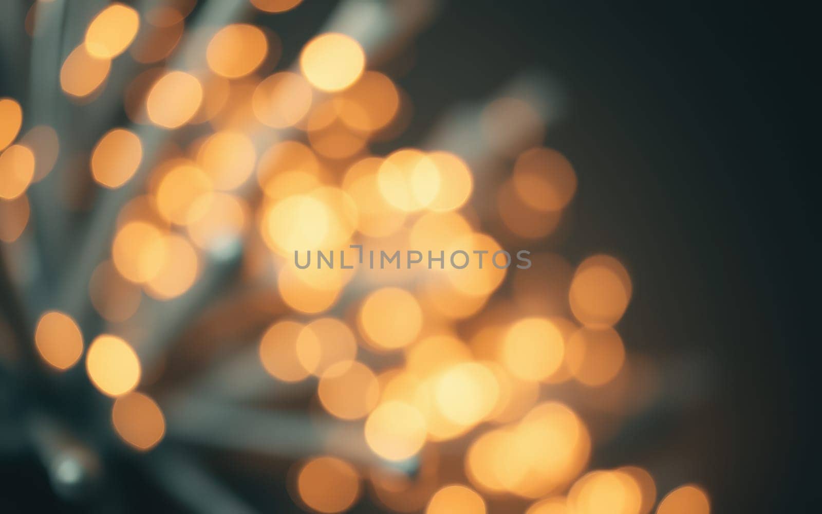A collection of soft, golden lights gently illuminates a cozy indoor space, creating a warm and inviting atmosphere for an evening gathering with friends and family.