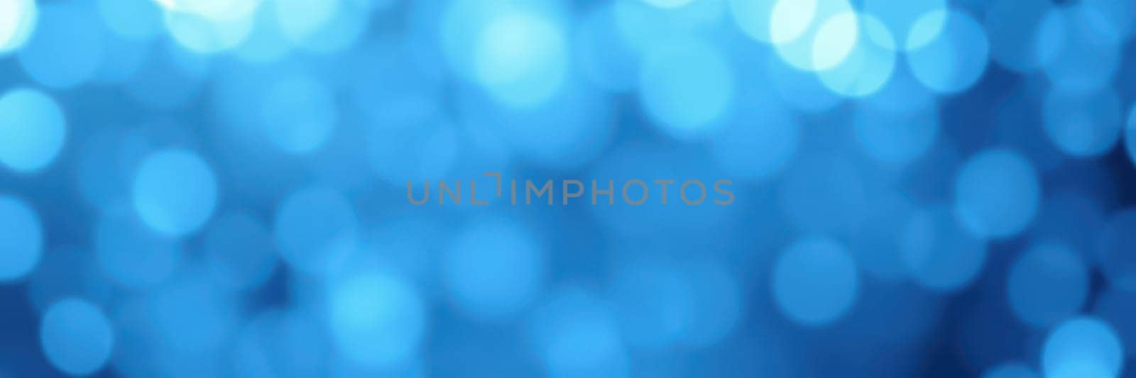 Soft blue bokeh lights create a dreamy effect, adding a sense of wonder to the atmosphere. Ideal for parties or magical occasions, these lights inspire creativity and joy.