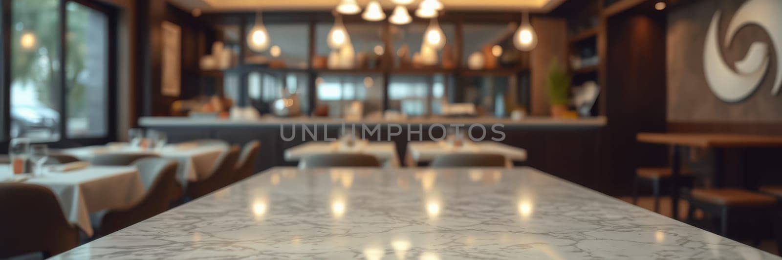 Light floods a stylish dining area featuring marble tables and modern decor, creating a warm and welcoming environment for guests to enjoy their meals.