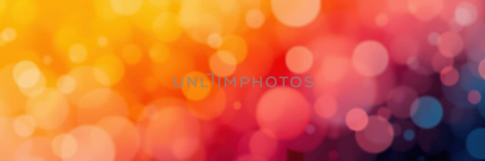 Brightly colored bokeh lights blend shades of orange, pink, and purple, creating a soft, dreamy atmosphere perfect for digital design or artistic backgrounds.