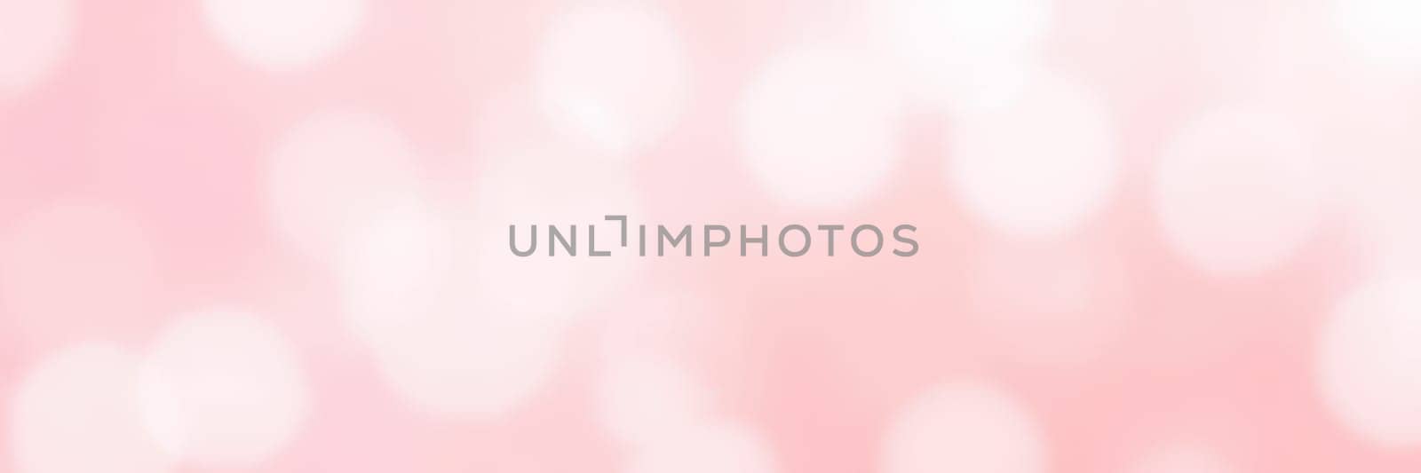 A soft pink bokeh background features blurred lights that evoke a calming and whimsical ambiance. Perfect for creative projects, it enhances visual appeal and mood.