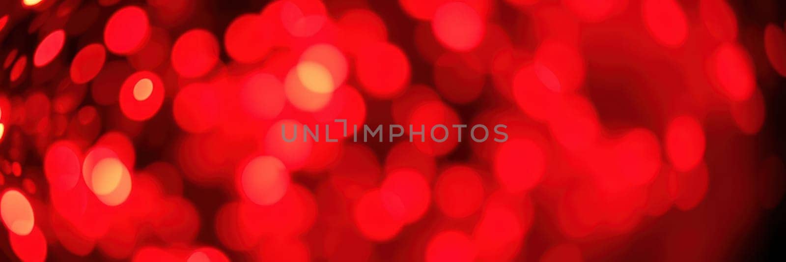 Soft, glowing red lights fill the background, creating a warm and inviting atmosphere for an evening celebration. The bokeh effect adds depth and charm to the surroundings.
