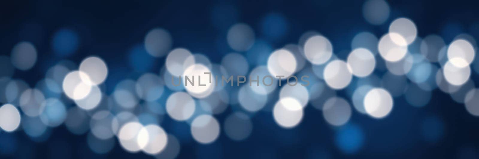Soft blue background filled with shimmering bokeh lights creates a tranquil and dreamy ambiance, perfect for evoking a sense of calm and wonder. Ideal for various designs.