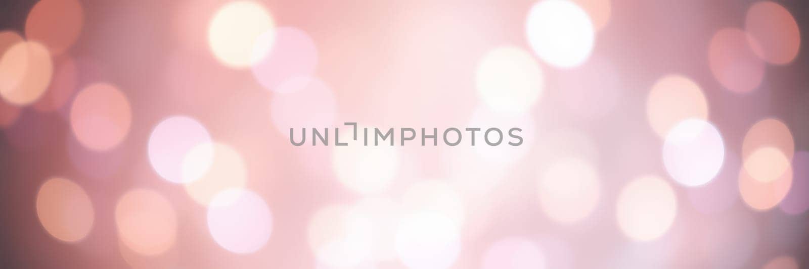 Blurred lights in soft shades form a warm, inviting ambiance, perfect for evening gatherings and celebrations. The atmosphere feels magical and festive.
