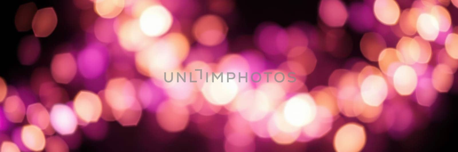 Vibrant purple and pink bokeh lights twinkle softly, enhancing the festive ambiance of an evening celebration. The blurred effect adds a dreamy quality to the surroundings.