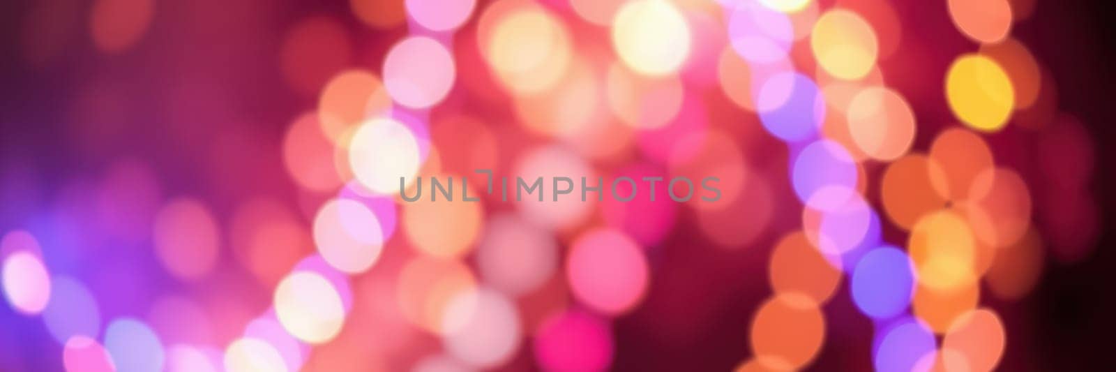 A dazzling array of colorful bokeh lights fills the background, creating a festive atmosphere perfect for celebrations. The lights shimmer in various hues, enhancing the joyful mood.