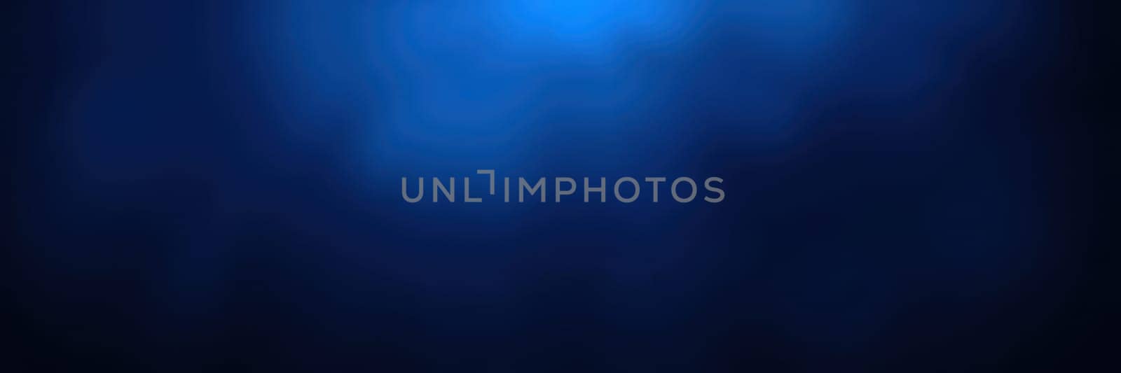 A rich blue backdrop displays a smooth gradient and subtle textures, evoking a calm and tranquil atmosphere, ideal for presentations or creative projects.