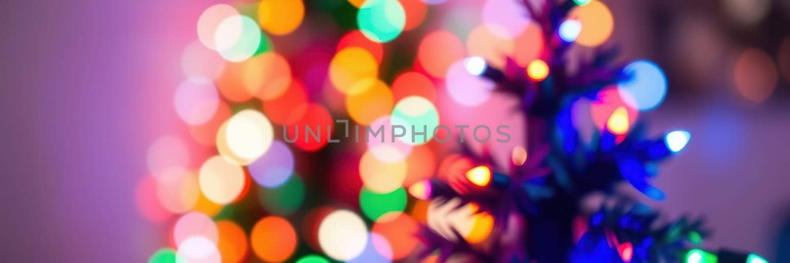 A beautifully decorated Christmas tree stands in a warmly lit room, surrounded by vibrant, colorful lights that create a cheerful holiday ambiance.