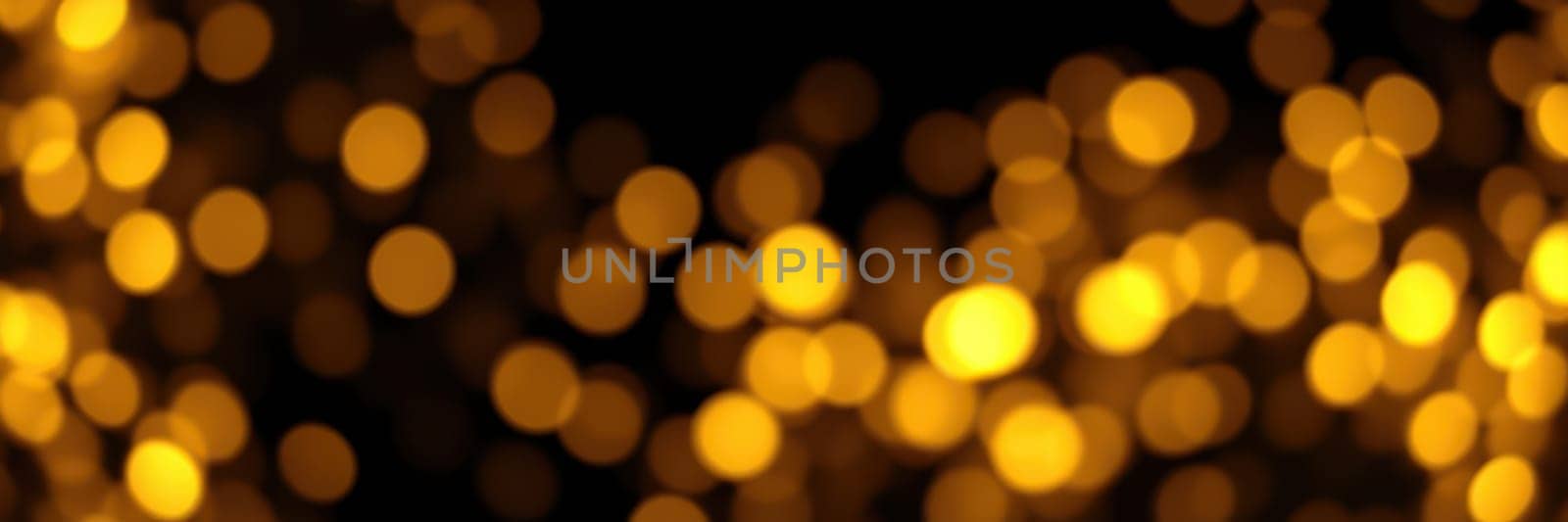 Soft, glowing golden lights shimmer in a blurred background, creating a magical ambiance perfect for festivities and special gatherings during the nighttime.