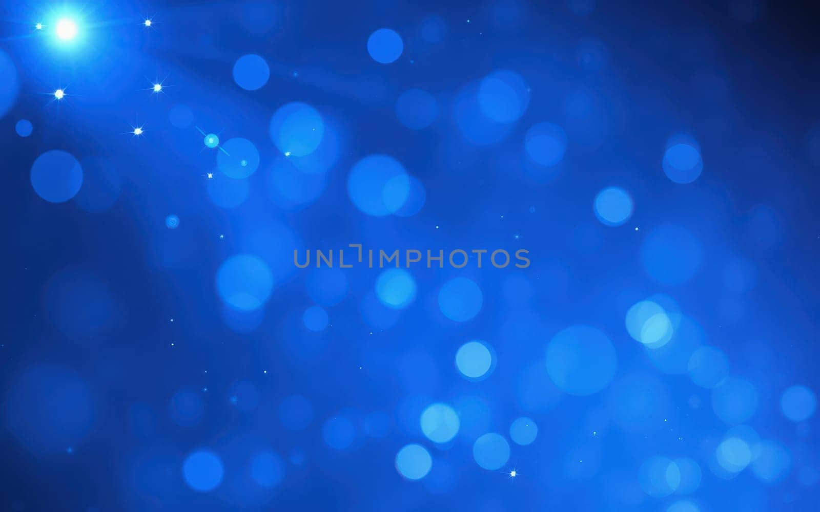 Soft blue lights sparkle in a bokeh effect, creating a tranquil and dreamy ambiance perfect for use in backgrounds and designs. The luminous glow adds depth and richness.