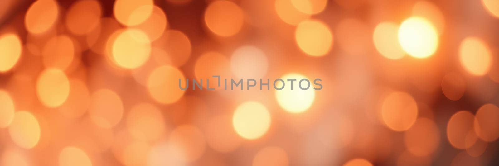 Blurry orange bokeh lights fill the background, creating a cozy atmosphere for an evening gathering, where people enjoy conversations and laughter.