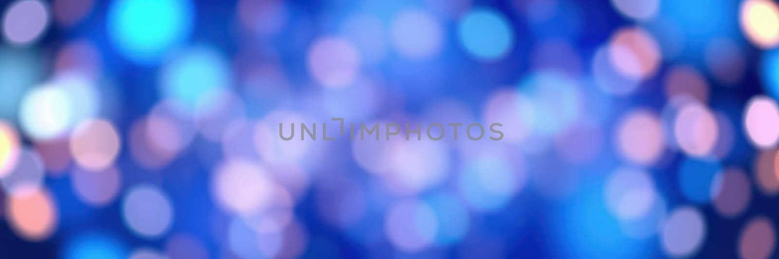 Soft, blurred bokeh lights in shades of blue and purple illuminate an evening gathering, enhancing the vibrant atmosphere of the urban location and the festive mood.