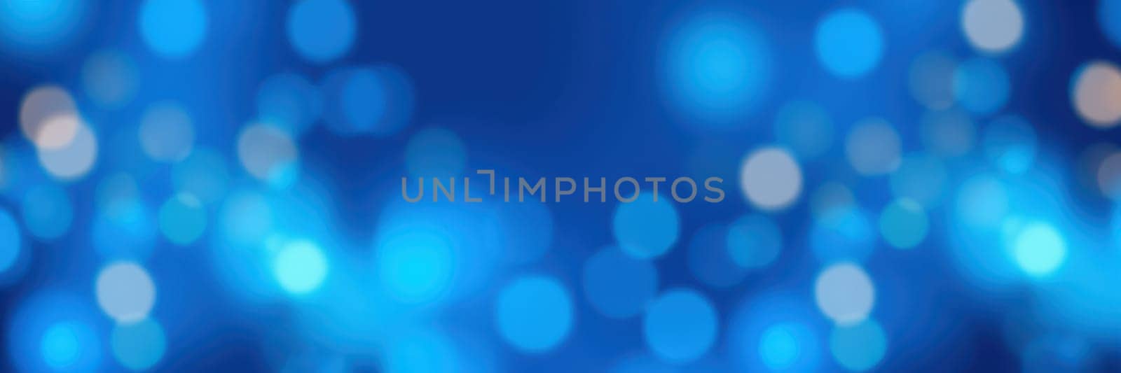 A vibrant blue backdrop features numerous blurred bokeh lights in varying sizes, creating a calm and engaging atmosphere suitable for creative projects and digital designs.