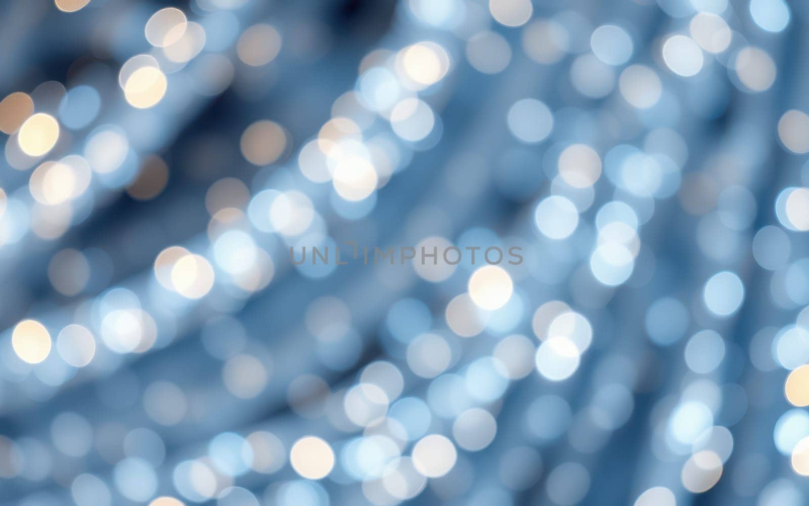 Sparkling blue bokeh lights form an enchanting backdrop, creating depth and a dreamy vibe. This soft focus effect suits various creative projects and visual media.