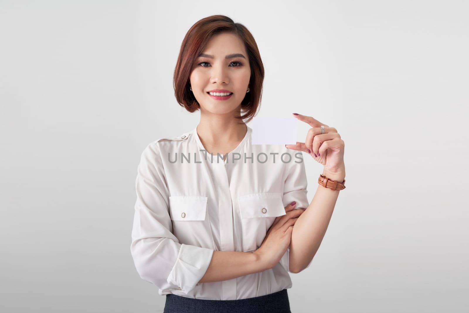 Happy professional woman businesswoman show business contact card for copy space
