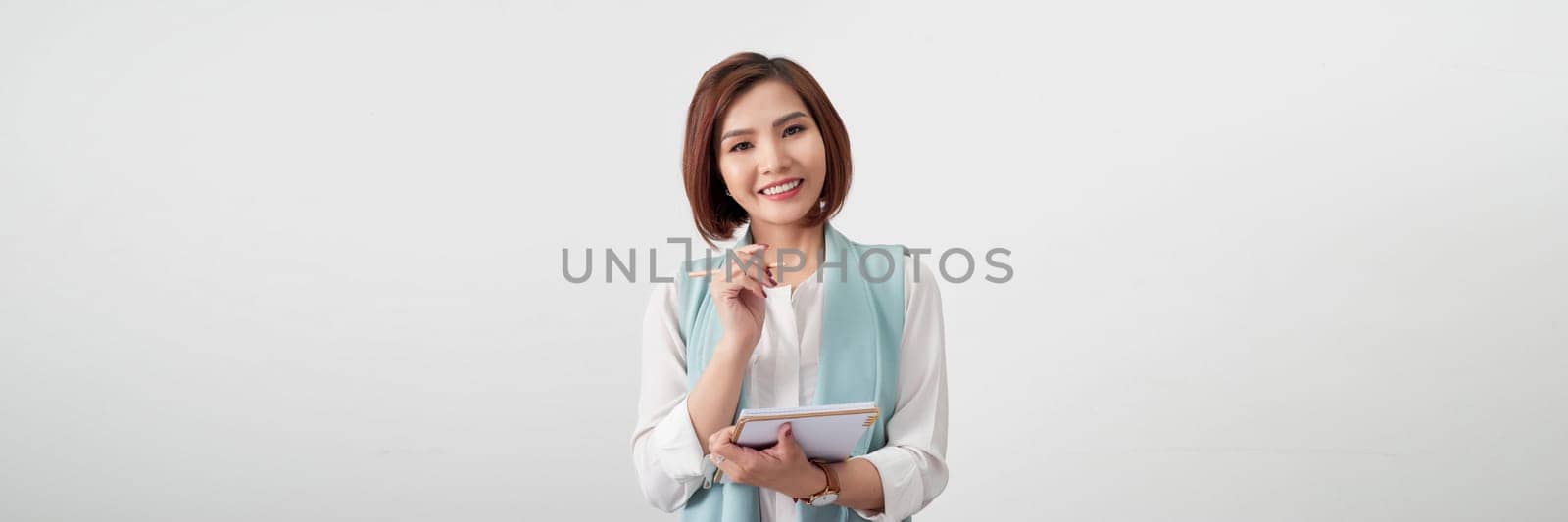Banner of happy pretty woman standing isolated on white background, holding clipboard by makidotvn
