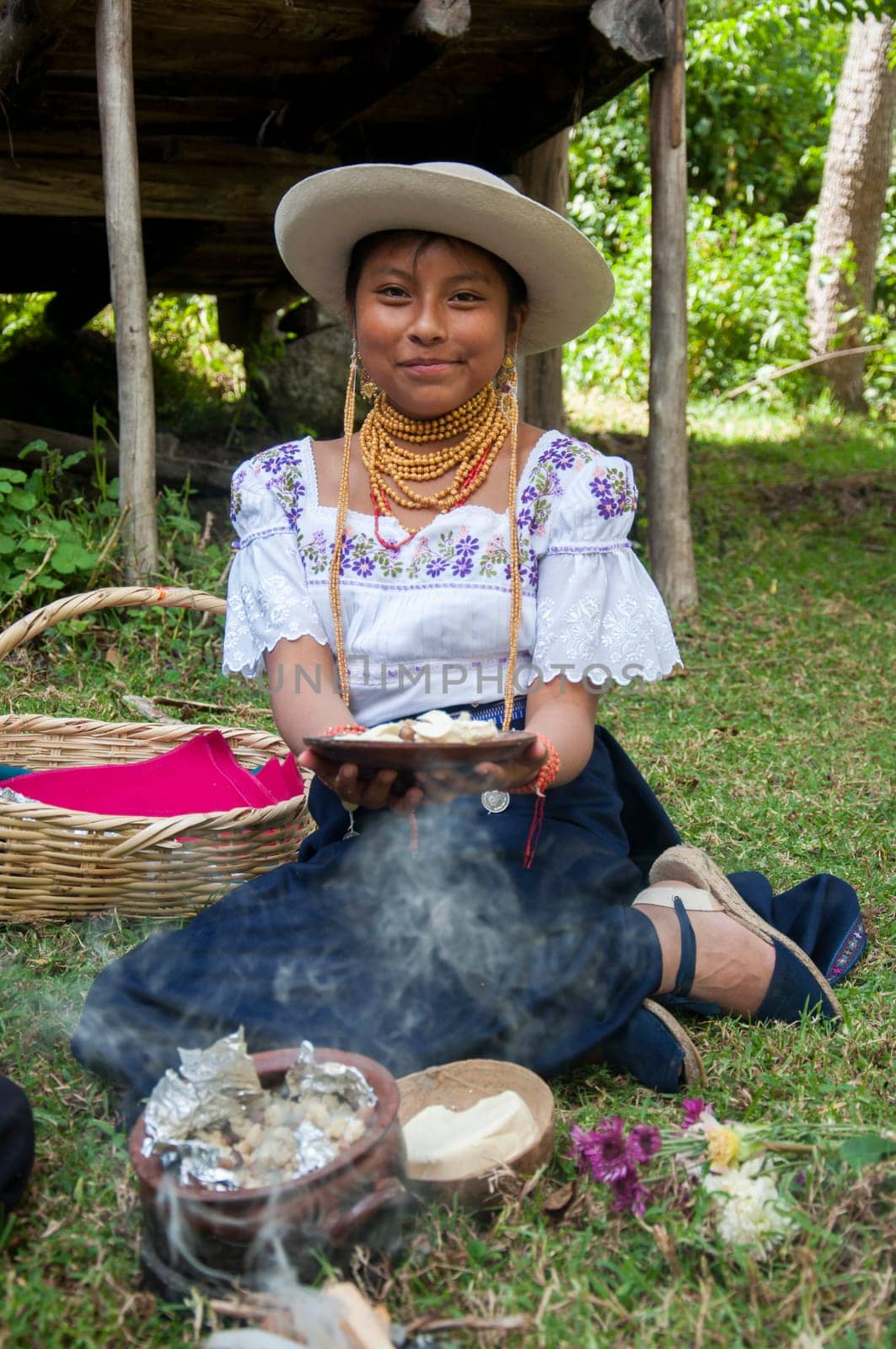 Chow Time with a Native Lady: Indigenous Gal Hangin' by Her Wooden Shack, Showin' Off Her Real Deal Traditional Grub and Some Smoke Show on the Side. High quality photo