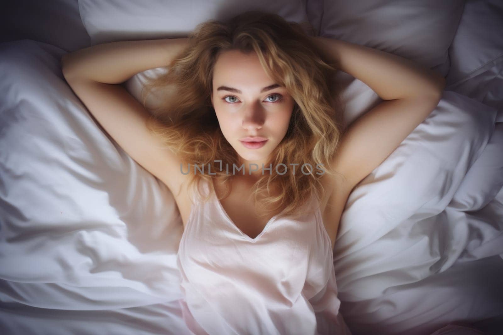 A beautiful woman lies peacefully on a white bed. by julyKoph