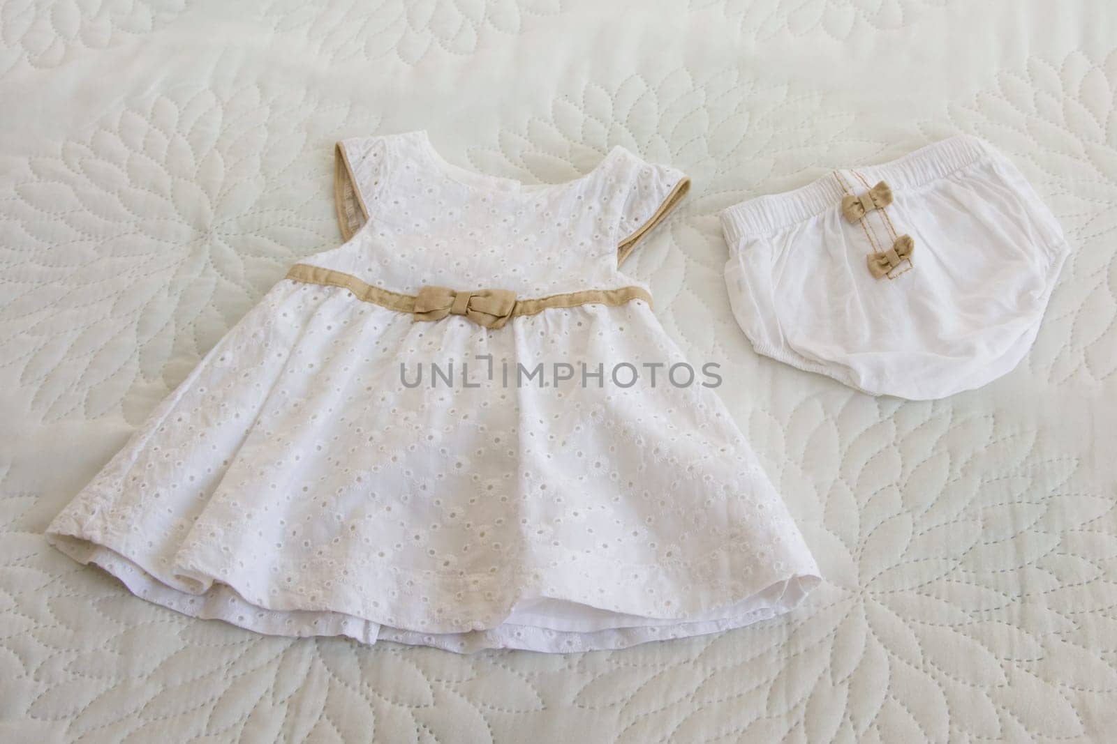 White dress and panties for the newborn girl