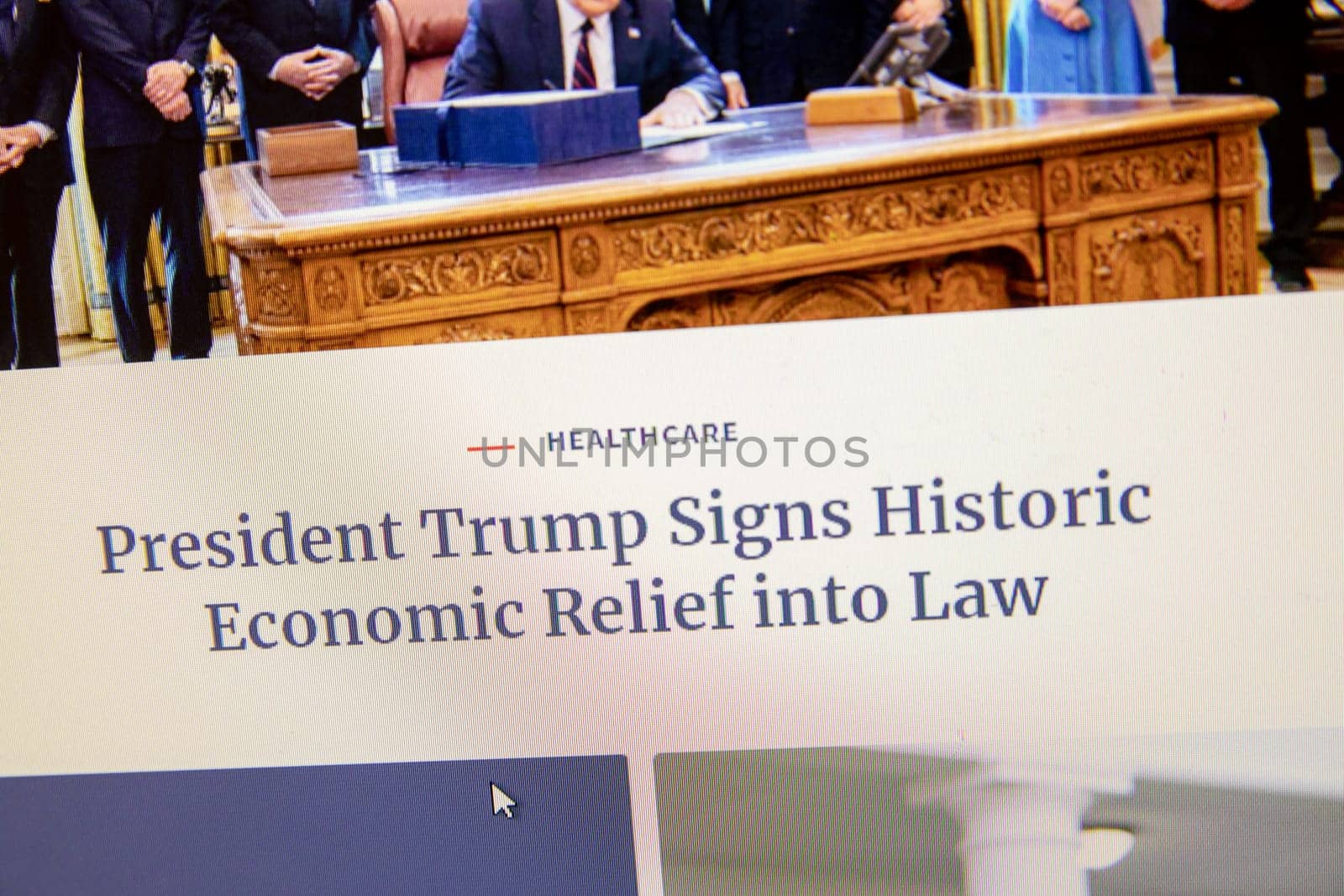 NAMPA, IDAHO - APRIL 14, 2020: trump signing a history economic relief plan during covid