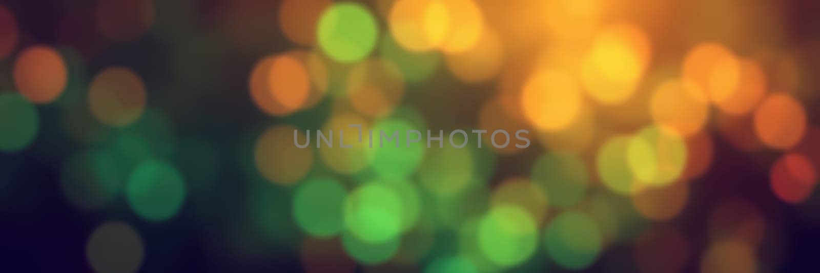 Vibrant, blurred lights in various colors fill the background, creating a joyful ambiance for a nighttime celebration or event with friends and family.