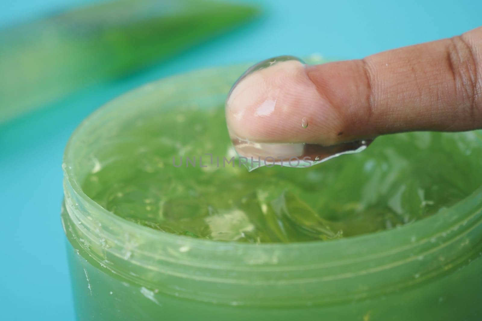 Close-up Fresh Aloe vera sliced and liquid gel on white background ,