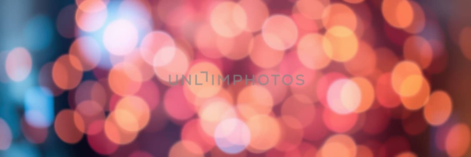 A multitude of softly glowing bokeh lights fills the background, creating a warm ambiance perfect for a cozy indoor gathering in the evening. The colors blend beautifully.
